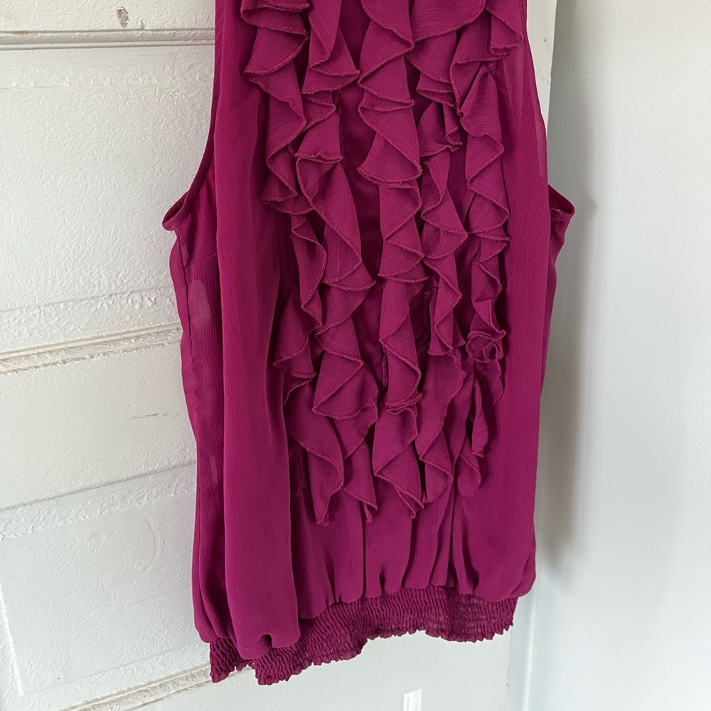 Cute burgundy blouse used but in good condition.